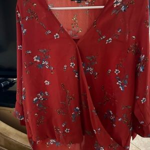 Red floral blouse